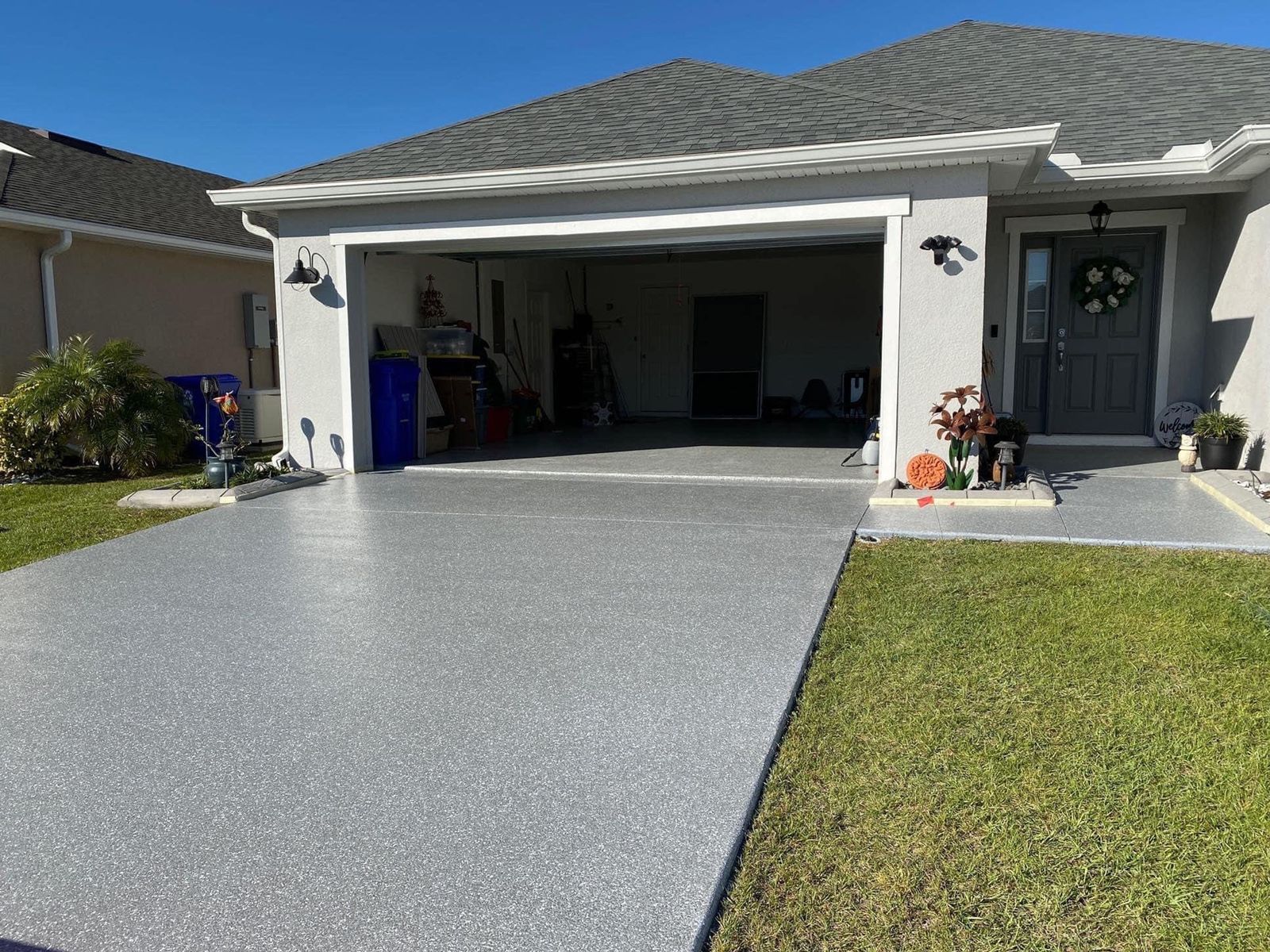 Flake coated concrete driveway and entry in St. Petersburg, FL
